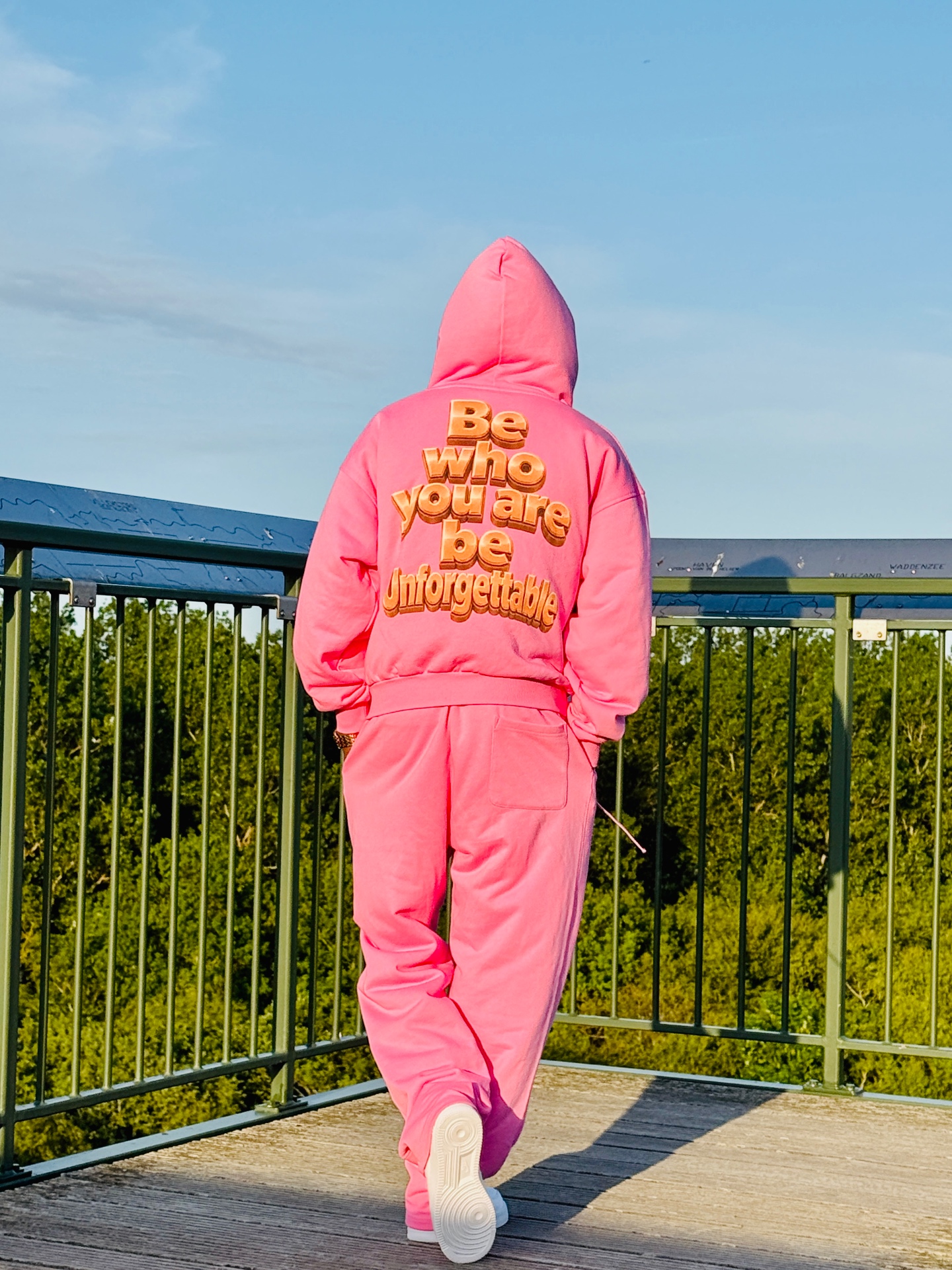 Back view of the MR. HAPPINESS pink Happiness Set — hoodie and joggers